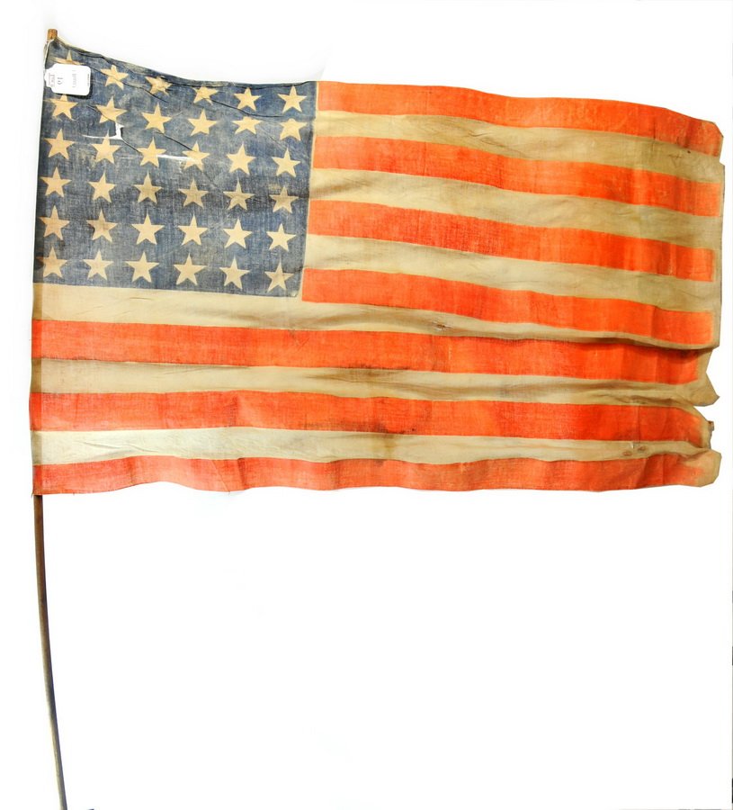 36 Stars United States Flag on wooden pole c. 1800's,: 36 Stars United States Flag on wooden pole c. 1800's, with some tears in the stars and stripes 41 x 27.