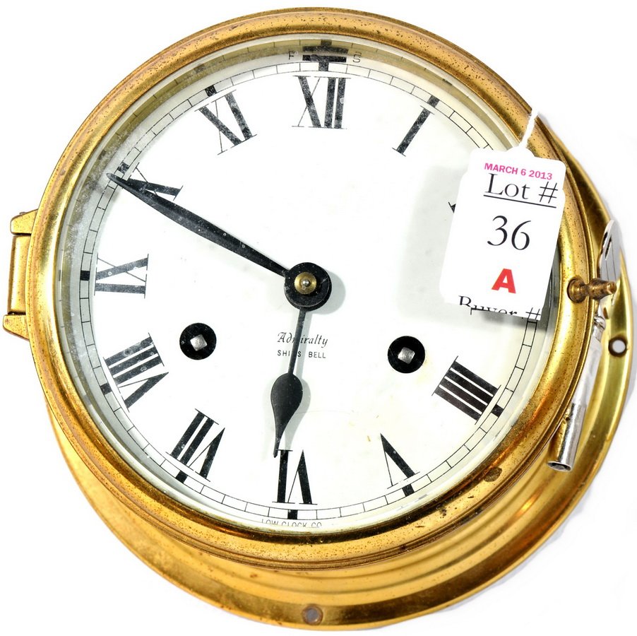 Admiralty brass ship's clock 7" with key: Admiralty brass bell ship's clock 7" with key made by Low Company
