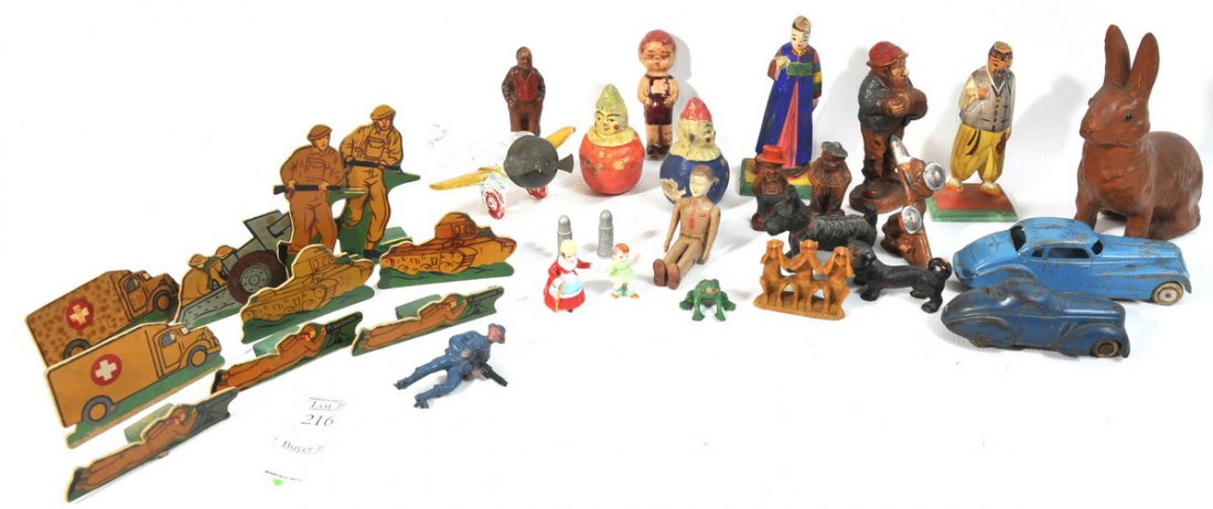 Misc. collection of small toys and figures to include g: Misc. collection of small toys and figures to include glass airplane candy dispenser with tin propeller end cap, 5" tootsie touring Sedan, 2.5" soap stone monkeys, pair of 3" paper mache clowns, cardb