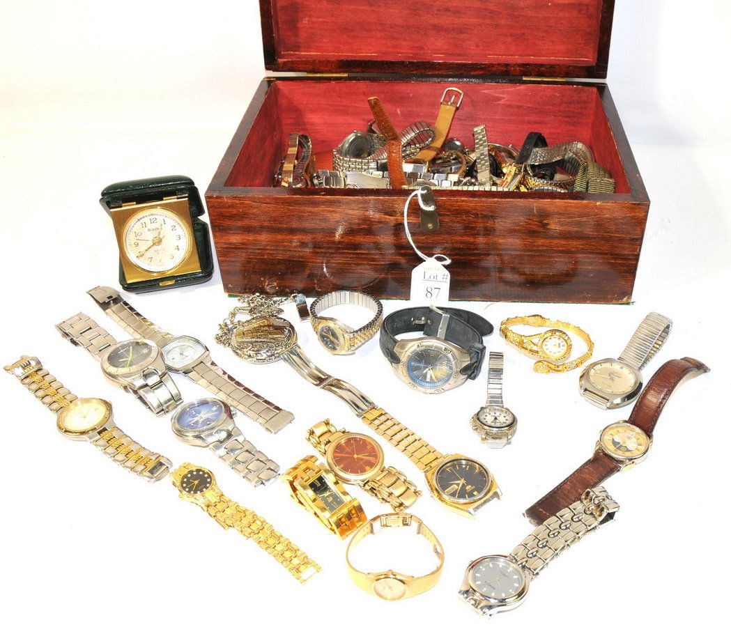 Misc collection of Mens and Ladies watches(SC3): Misc collection of Mens and Ladies watches in 12 x 8 x 3.5 wooden box to include: Kenneth Cole, Bulova, Timex, Armitron, Seiko, Swiss Movado, Citizen, Jordache, Elements, Geneva, Fossil, DKNY, Regent,
