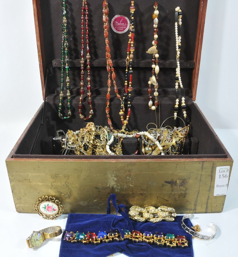 Gold colored box of colorful jewelry(BS): Gold colored box of colorful jewelry to include beaded necklaces, bracelets, rings, earrings clip/pierced, watches with and without straps.