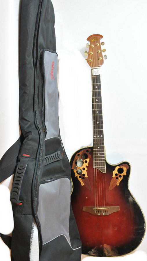 Ovation acoustic guitar in case(CG): Ovation acoustic guitar in case