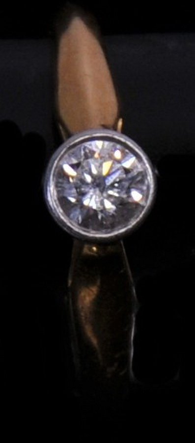 Ladies 18Kt. Diamond Solitaire Ring/SC1: Ladies Diamond Solitaire ring set in 18Kt. approx. 1/6 ct. diamond weighs 4 grams size 6