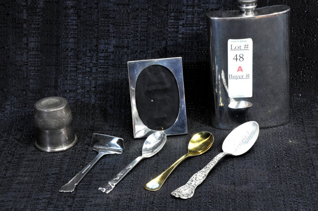 Misc. Sterling Lot SC1: with picture frame, sterling thimble cordial, 4 sterling spoons including Georg Jensen baby spoon, and Cohr baby spoons, and Sheffield England Silver Plate Pewter base flask