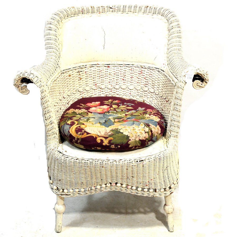 Antique Wicker Chair CG: leather surrounded by wicker, rounded arms, painted white signed Heywood Wakefield fresh from old Maine camp, 33 x 30, 19" oval seat.