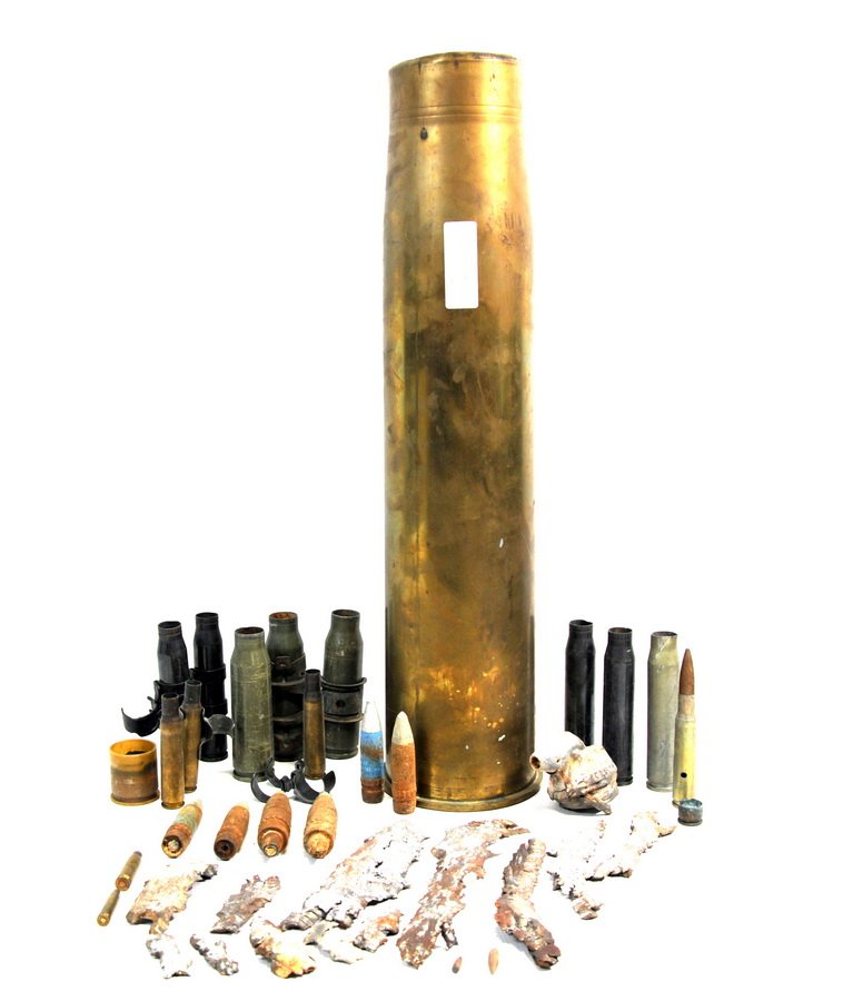 Military collection WP6: Collection of shrapnel, 25 mm, 20 mm old casings with 105 mm brass shell casings 24.5" height.