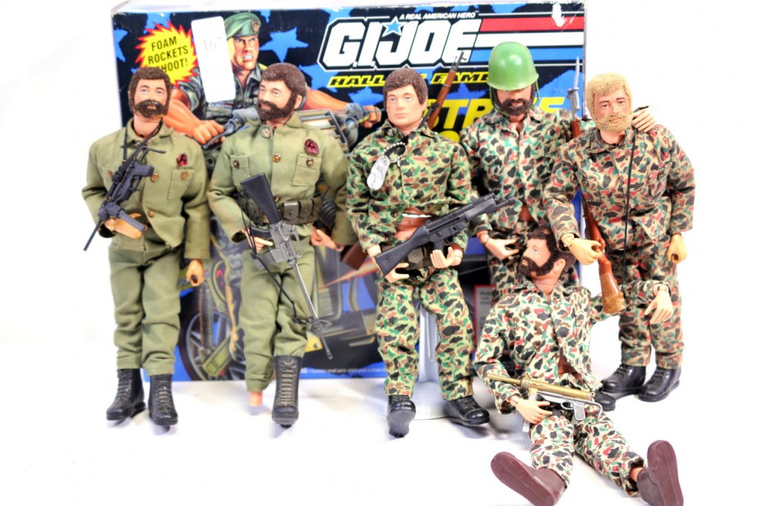 Hasbro G.I. Joe Collection REAR: 6 Action Soldier figures some in fatigues, circa 1964 and Hall of Fame Strike Cycle in original box (new).