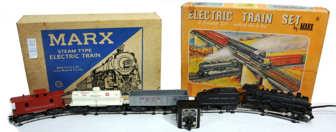 Model Train Set T5: Electric Train set made by Marx includes steam engine, rolling stock, track, and transformer. Also included: Empty box for Marx electric train set.