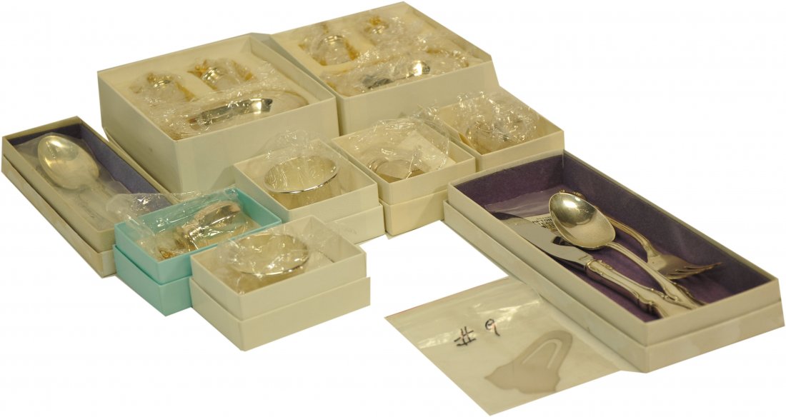 Fine Collection of new old stock Sterling: including Reed and Barton, Empire Silver Napkin rings, and more in original boxes