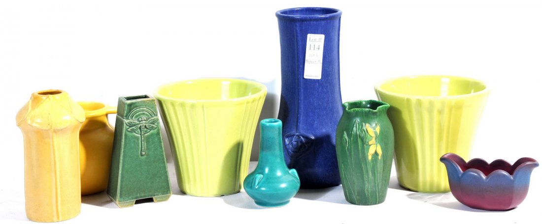 9 pieces of Contemporary Pottery: to include: 7" and 10" piece of Door pottery, 6" Jesse Wolf vase, 6" double handle piece of Rookwood vase, 3" Van Briggle, 5" pottery vase signed Ross on the bottom along with two Abingdon planters.