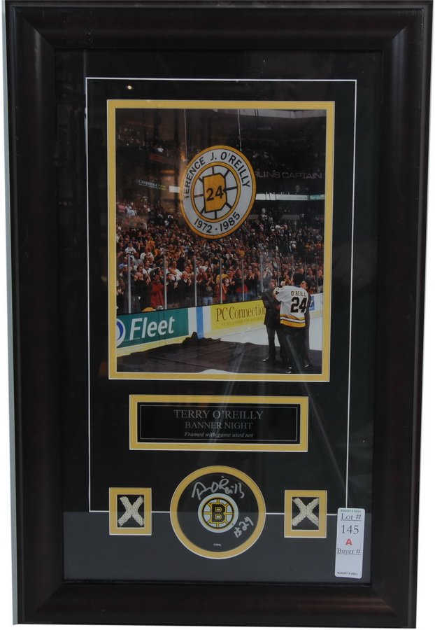 Terry O'Reilly Banner Night Autograph: Puck and Game Used Net, nicely framed 23x15