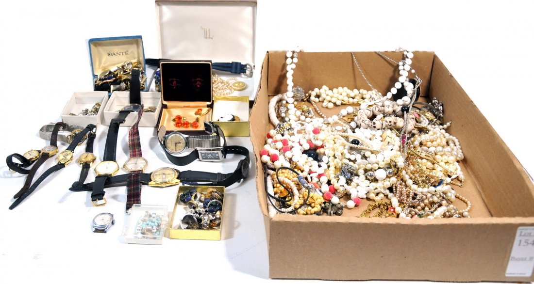 Collection of colorful Costume Jewelry: beaded necklaces, wrist watches, bracelets, brooches, clip on earrings, tie clips and cufflinks.