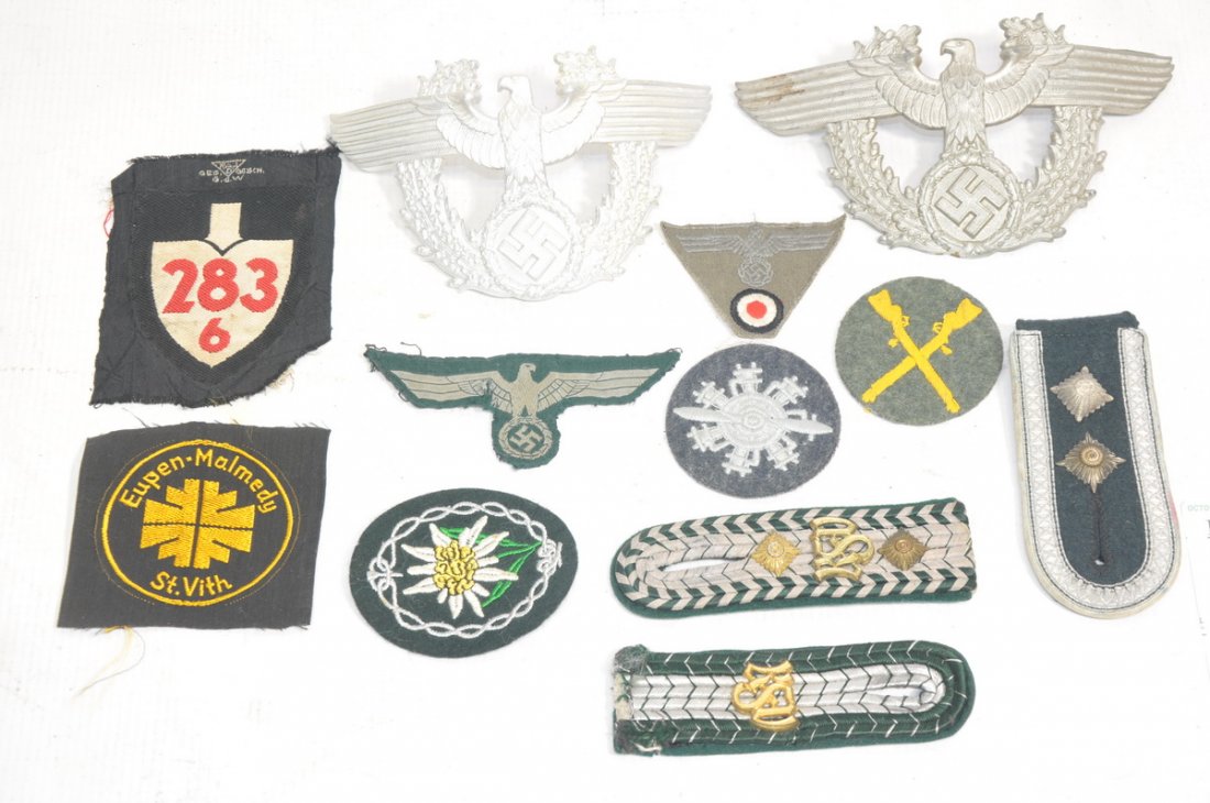 Collection of WWII Nazi Insignia: Including 2 Nazi Peaked Hat Badges, 1 Nazi RAD Officers Bevo Weave Shovel Patch, 1 German Turnverelin District Patch Eupen-Malmedy St. Vith, WWII German NCO Collar Board, 1 German Army Elite Mountain 