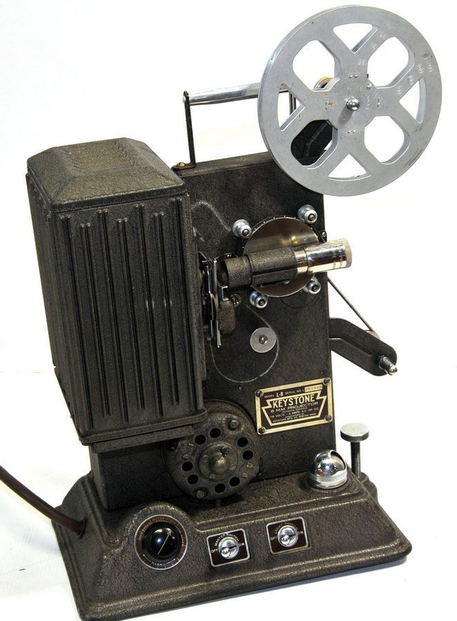 Keystone Model L8 super 8mm projector: comes with the case and other extras.