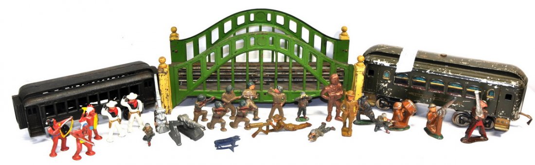 Collection of old toys: Including lead soldiers, cowboys and Indians, Lionel car and bridge and cast iron train