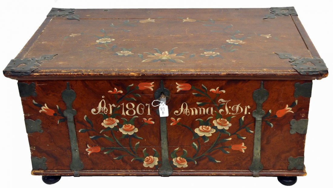 Pine country blanket chest with original hardware: hinges and handles. Painted flowers inside and decorated outside reads: "Ar, 1807 Anna J. Dr:."Has original casters with added feet. Chest has an inside compartment with cover. 40.5 x 24 x 19