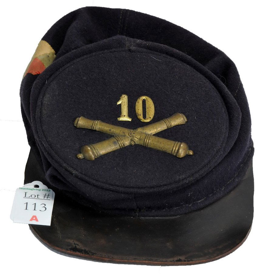 Civil War Forage Cap: Union forage cap with crossed cannons (meaning artillary) and brass #10. on the right side of the cap is the corp badge of the Third Corp (multi color 1st 2nd and 3rd Divisions). Missing the chin stra