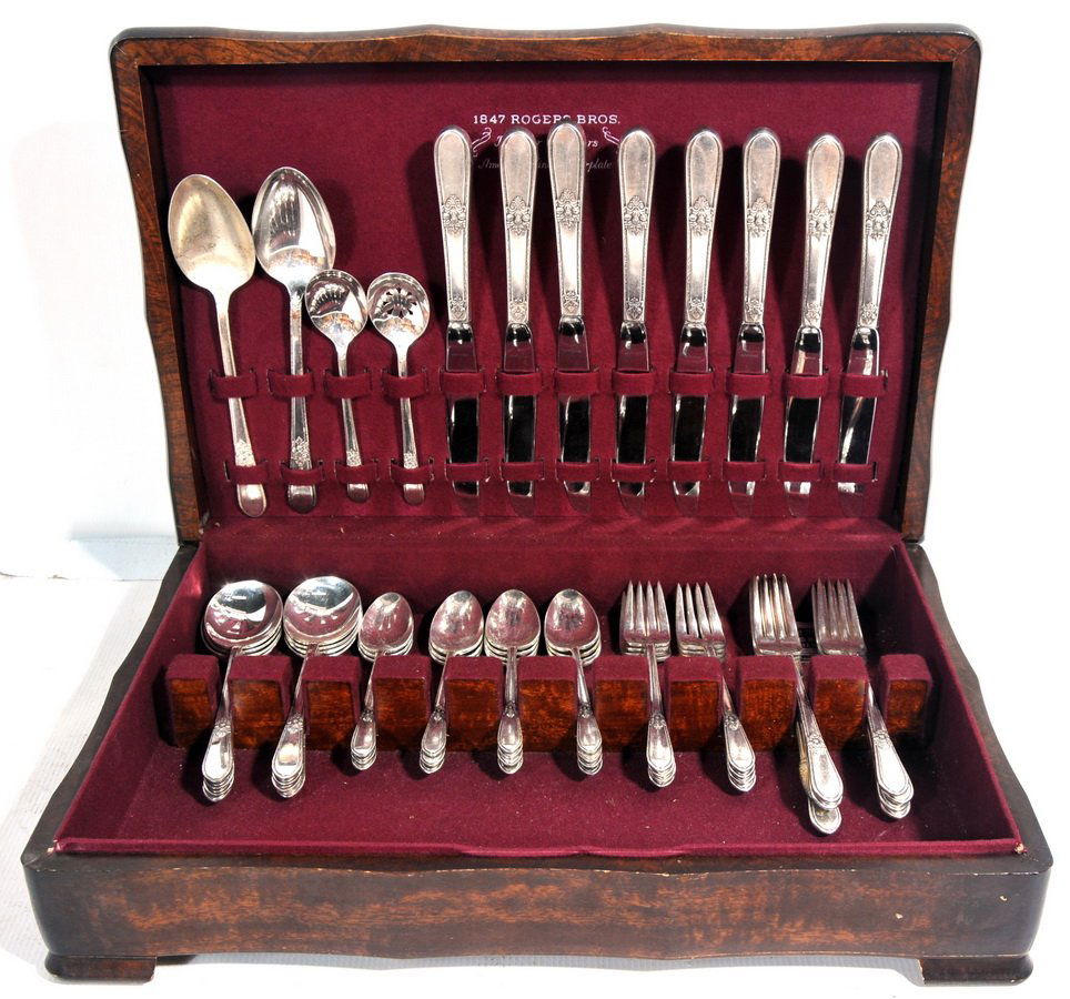 1847 Rogers Bros Silver-plate Flatware Set For 8: This silverplate service set for eight is made by Rogers Bros in the Adoration pattern. Included are: eight salad forks, eight dinner forks, six tea spoons, eight soup spoons, eight dinner knives, two