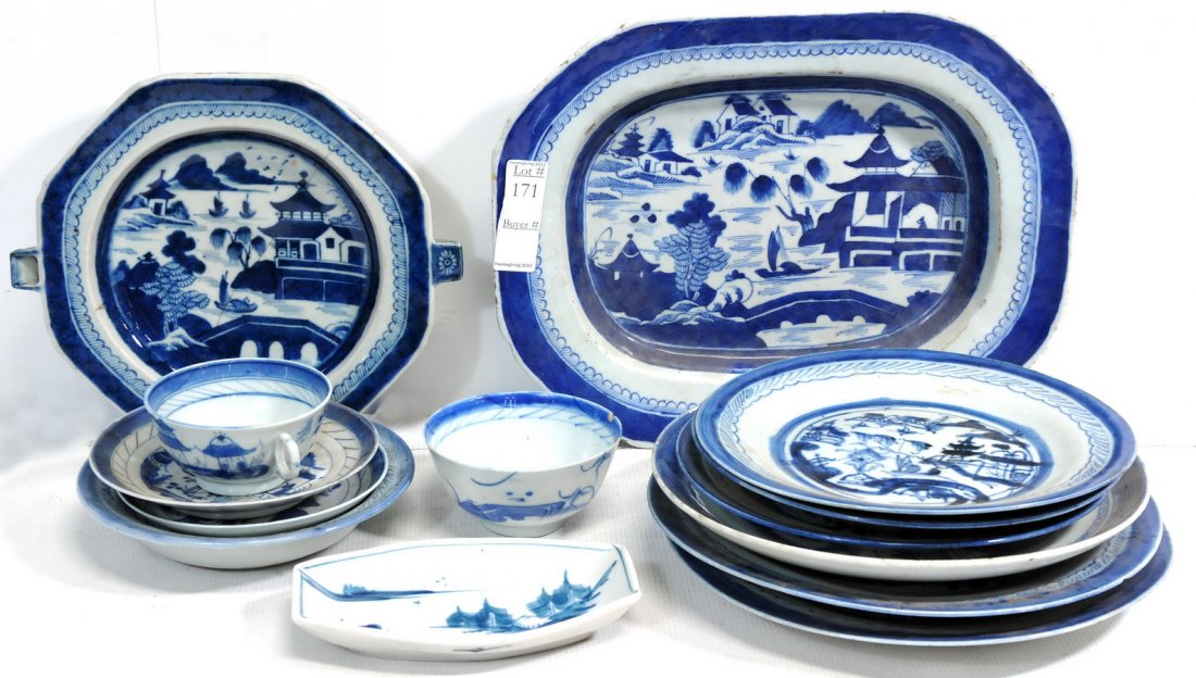 Chinese Porcelain Blue and White Canton: to include: three 8.5 plates, two 10.25 plates chipped, one 10" deep plate, 13.25 deep platter with minor chipping around the edge, warming plate 10.25 with crack across the top. 7" bowl, 5.5 saucer, 