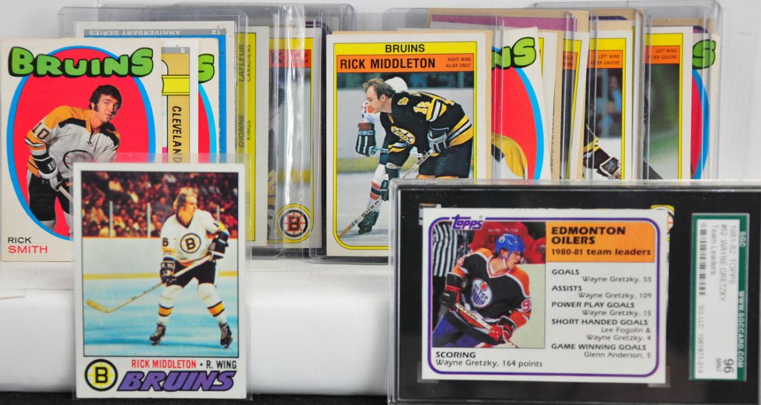 Collection of Vintage Hockey cards: Including 1981-82 Topps Wayne Gretzky SGC Graded 96 Mint, 1979-80 OPC Wayne Gretzky Assist Leader, 1992 Wayne Gretzky Rookie Card Reprint, 1981-82 OPC Ray Bourque In Action, 1981-82 Brad Park, 1982 Te