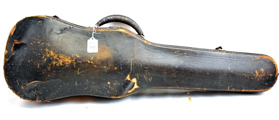 Vintage Nicolaus Amatus Violin: Inside label reads Nicolaus Amatus fecit in Cremoria 1672. Instrument is 23" long and comes with carrying case and bow. There are two surface cracks, one 2" on the bottom right and one 3.5" crack on u