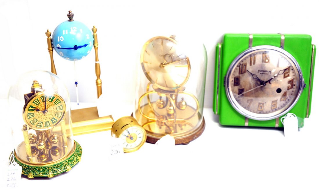 Lot of 5 Vintage Clocks: Lot includes an 8 X 8" wooden Ingraham 8-Day Wall Clock in lime green; a 2" faced Ansonia brass clock with a pat. 1878; an 8" tall Kern dome top clock; an 9.5" tall West German Kunche dome top clock,