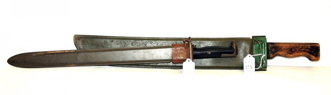 WW II US M-1 Garand Bayonet and 1945 Machete: WW II US M-1 (long) Garand bayonet dated 1942 in the original scabbard marked US and a Martin Machete made in Belgium with scabbard marked "Co. 1 1945."