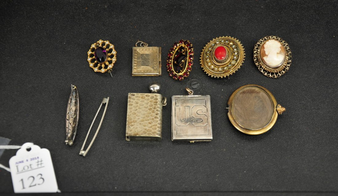 Lot of Estate Sterling and Costume Jewelry: To include three lockets, a cameo pin or pendant, hair locket, and five pins. Aprrox. 2 ozt sterling.