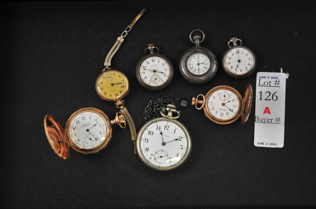 Lot of 7 Watches: Includes a gold filled Swiss made Bondale in decorative case, an American Waltham in decorative gold case, a gold Waltham wrist watch, and 4 other silver watches.