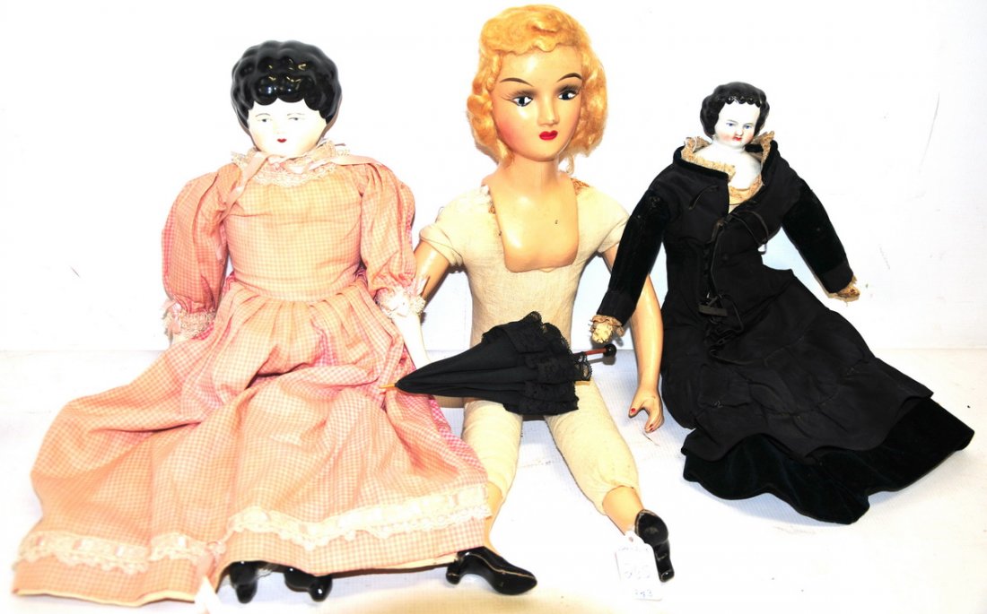 Collection of three vintage dolls: One 23" doll with plastic head, bust, feet, and arms and cloth torso and legs; one 19" doll marked "Nara 1971 on her back, with porcelain head and lower arms and legs; and one antique 17" doll with a 
