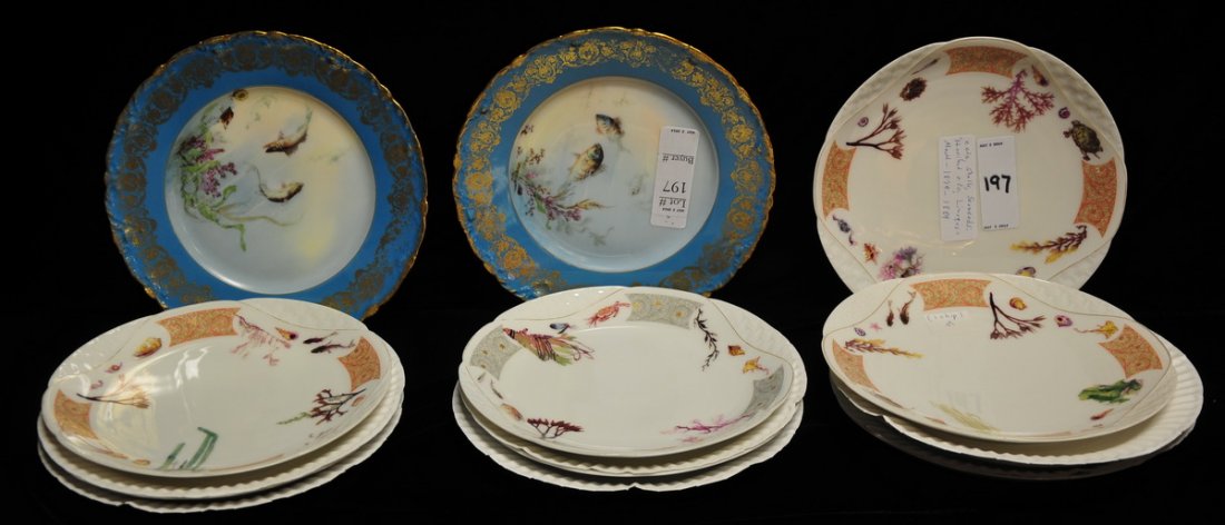 10 19th C Haviland Limoges Fish Plates: Includes 8 8 1/2" Haviland/Limoges plates painted with fish, eels, seaweed, and turtles (one has a tiny chip), circa 1879-1889; and 2 9" plates rimmed in blue and gold with painted fish, "Theodore" ha