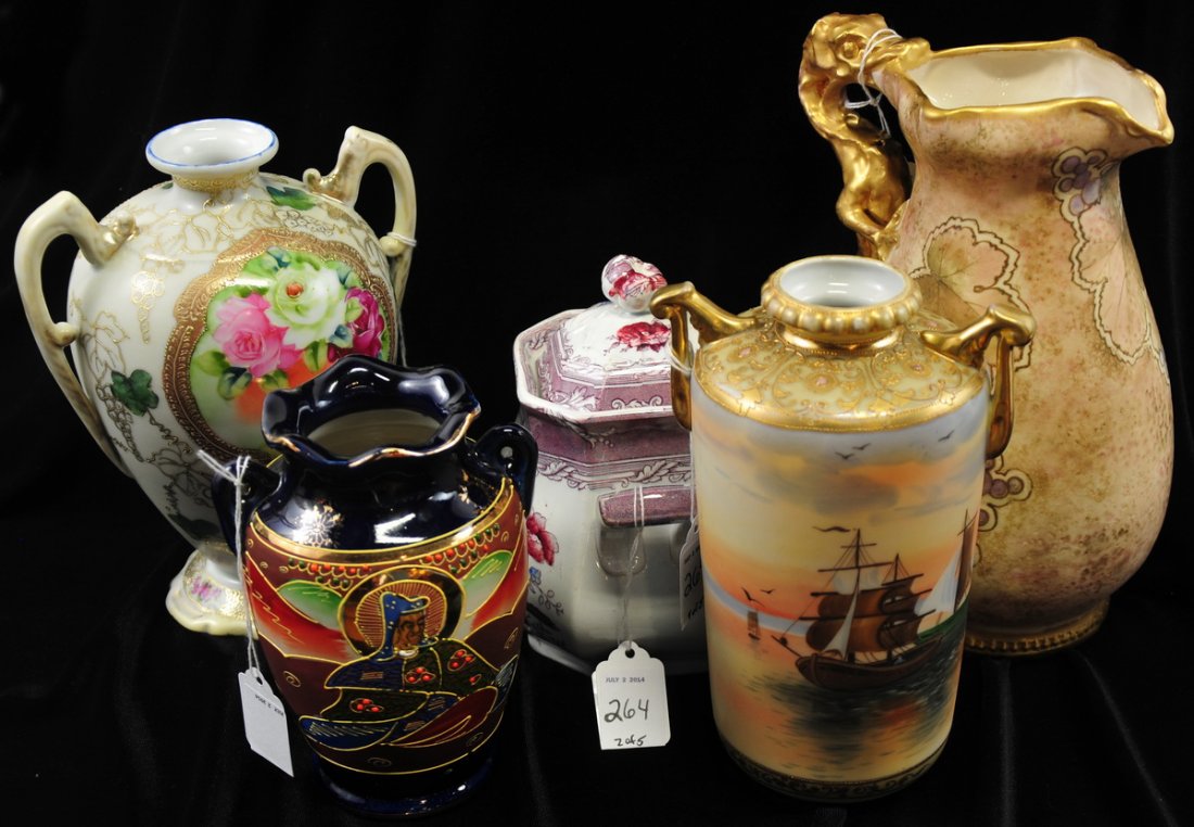5 Hand-Painted Porcelain and Ironstone Pieces: Includes a 10" pitcher with leaves and grapes motif and a gold dragon for a handle, marked "Turn-Teplit R ST K, Bohemia; an 8" Nippon double handled vase with hand painted boat scene; an 8.5" double h