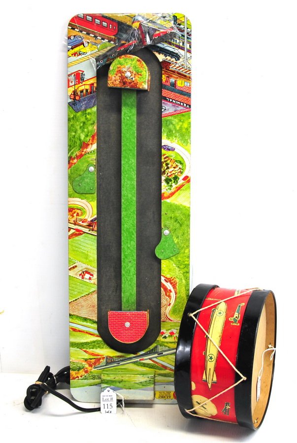 Vintage Tin Litho Drum and Train Set: Includes a Marx 1949 Tin Litho Magic Mot-O-Run electric track with 4 cars, and a tin litho toy drum, red with green and off-white airplanes and zeppelins. Drum measures approx. 5" X 9" and track measu