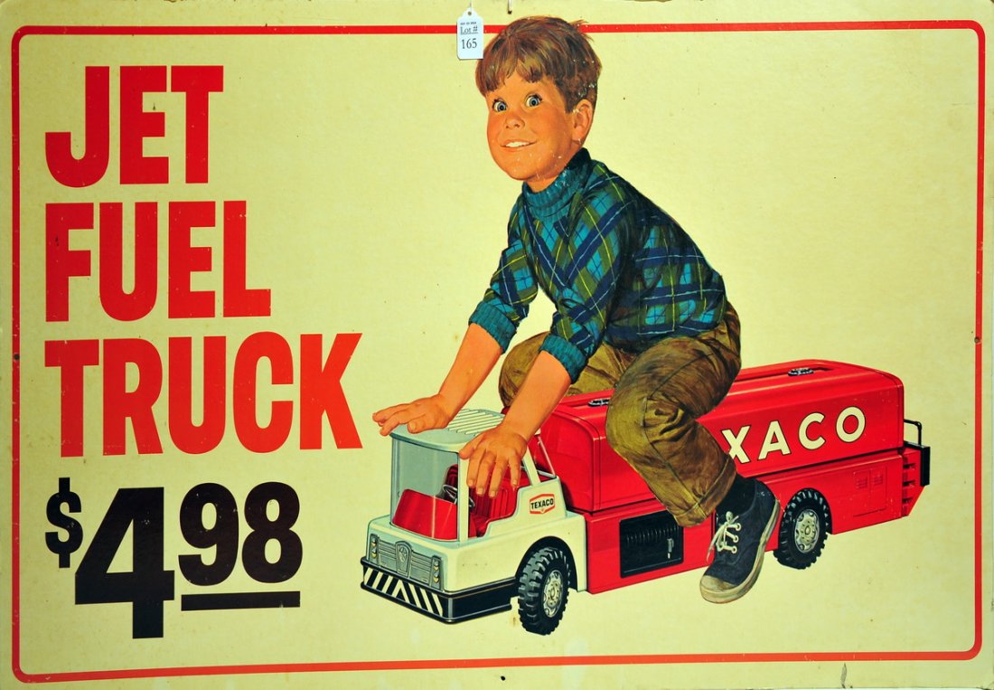 Vintage Texaco Jet Fuel Truck Ride-On Toy Sign: Great vintage advertising sign showing a boy riding on a toy Texaco Jet Fuel Truck, which sold for $4.98! Cardboard sign measures approx. 42" X 24."