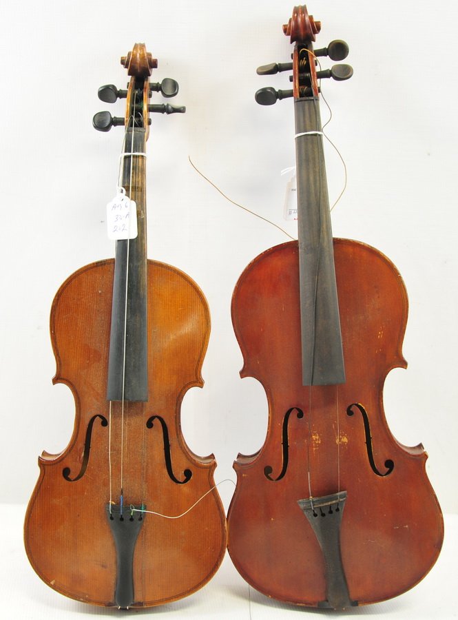 Two estate fresh violins: J.A. Baader & Co Mittenwald violin, copyright 1790 label inside 23 1/2" in length with bow is 29 1/4"inches with mother of pearl inlay. The other has a partial label inside identifies as Trademark 22"
