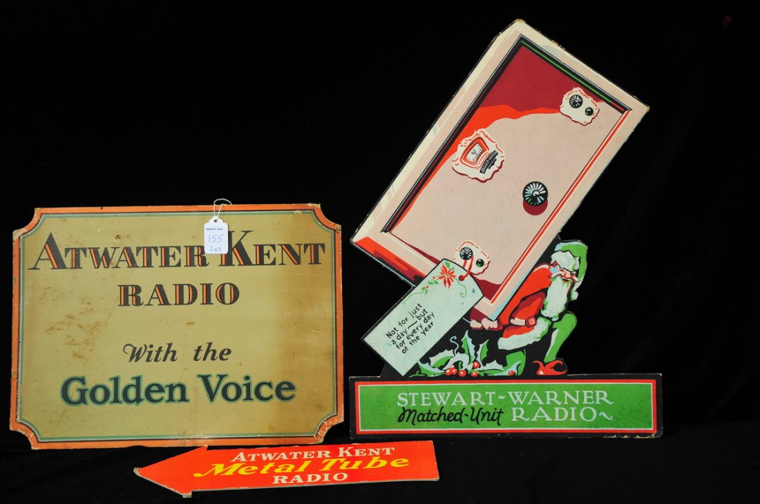 Atwater Kent & Stewart Warner Radio Advertising: Includes a 1920s Stewart Warner Radio "Matched Unit" Santa sign, a 1920s Atwater Kent Radio Golden Voice sign, and a 1930s Atwater Kent Radio "Metal Tube" red arrow sign.