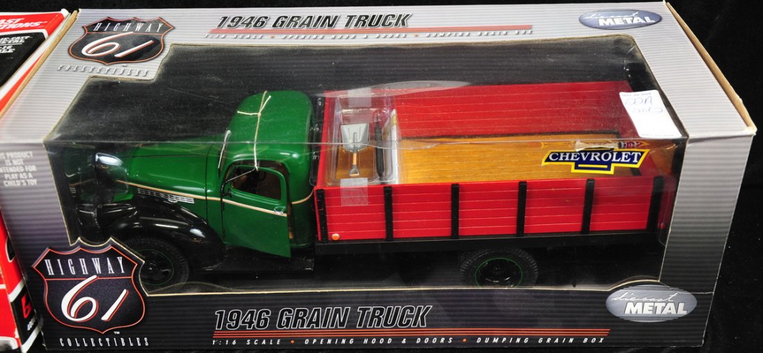Two Vintage Toys New In Box: 1946 Chevrolet Grain truck and International Fire Truck