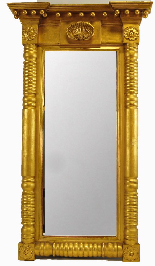 American Empire Style Mirror c. 1820's/30's: with ringed columns, 15 gilded balls, applied shell and flowers. Mirror is divided into two sections, it's a wonderful old antique mirror, 25"W x 44" H.