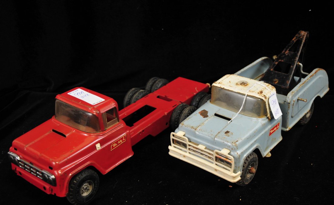 Collection of 8 Buddy L trucks: Collection of 8 Buddy L trucks