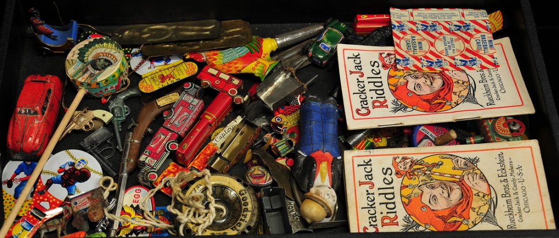 100 Plus Misc. Small Toys Incl. Black Americana: Includes more than 100 small vintage toys, 10 pieces of Black Americana, Cracker Jack toys, tin litho toys, whistles, openers, crickets, etc.