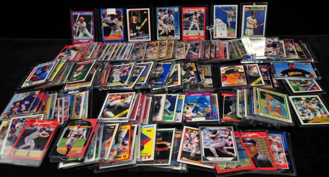 150 Star Baseball player cards: includes Ripken, Ryan, Brett, O. Smith, Puckett, Mattingly, Barry Bonds, Mark McGwire and more. All in plastic cases, Upper Deck, Topps, Fleer and more.
