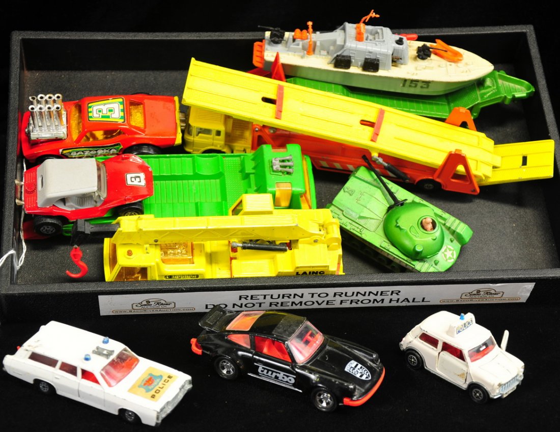 Lot of 1970s Matchbox Super King, Speed King: 10 Matchbox vehicles (Porsche, cranes, car transporter, etc.) plus a Dinky Toy Motor Patrol Boat made in England.