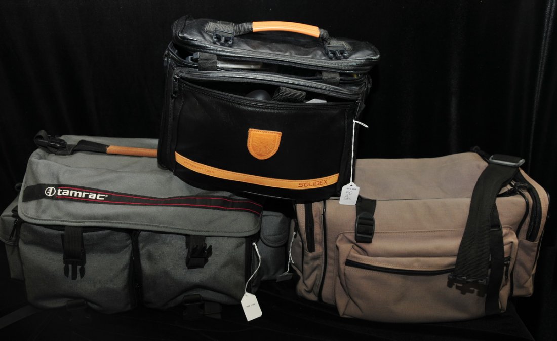 Collection of camera related items: to include: Nikon 35mm film camera model no N90S, Sunpak potato masher flash with power supplies, remote trigger and Nicad packs, Tokena AF 28-70mm lens. Quantary Tech-10 F=70-210 mm lens, three full