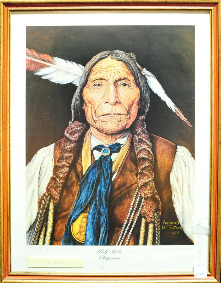 Framed print of Wolf Robe, Cheyenne: Indian 25 1/2" x 19 1/2". Pencil signed by the artist Armand LaMontagne. Inscribed to Les and Val Ranco, on back it signed March 24, 1979 to Les and Val, Happy 50th, Steve Mitchell.