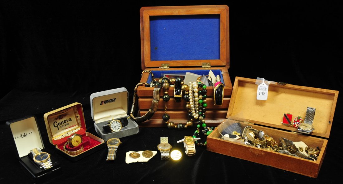 Collection of costume jewelry: with watches, long strings of beads, earrings, bracelets.