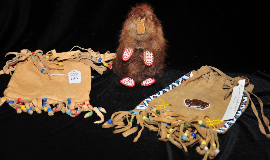 Collection of Native American items: to include smaller deerskin pouch c. 1960's, fur beaded beaver and Penobscot Deerskin beaded pouch c. 1950's.