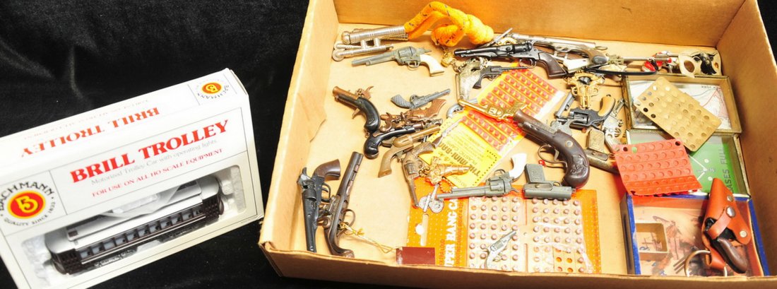 Collection of Cap Guns and Hand Held games: Collection of Cap Guns and Hand Held games