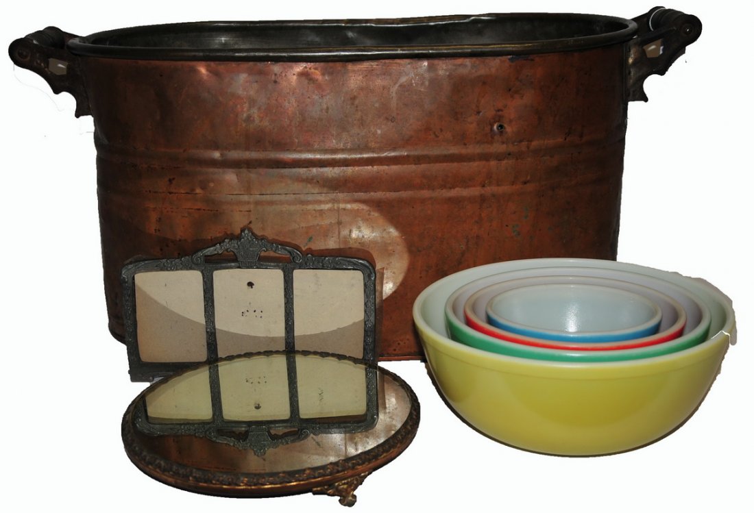 Collection of misc items to include:: old copper boiler, cast iron triple frame 10" x 6" outside frame, a round decorative pin footed mirror 10" in diameter, nest of four colored Pyrex bowls.
