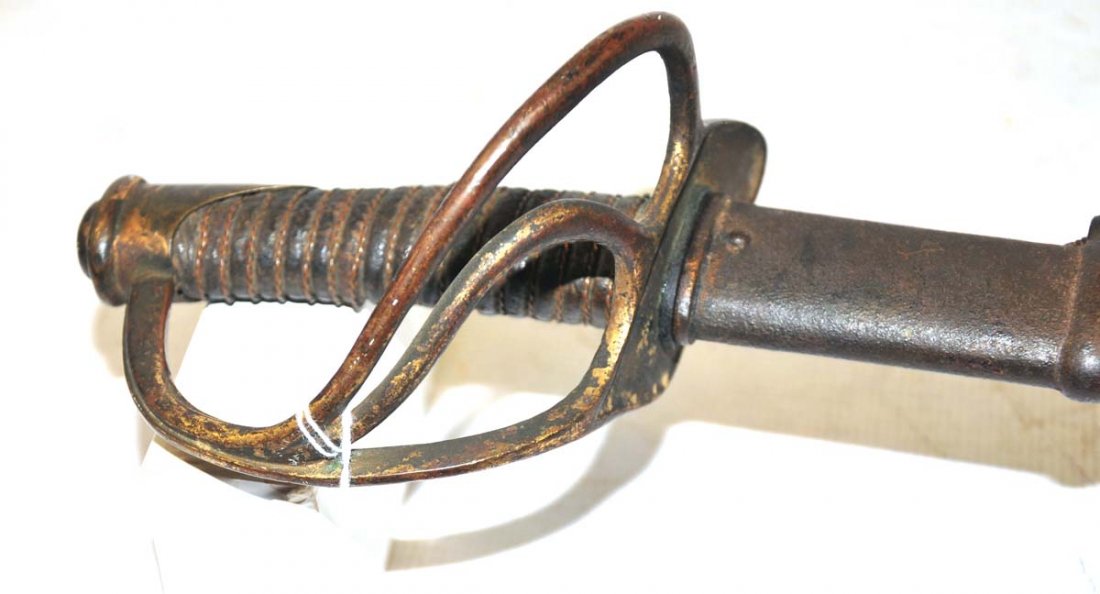 Model 1840 heavy Calvary Saber with: scabbard, soldier's terminology " old wrist breaker", leather wrapped, perfect patina with inspection stamp KKKK. This is a veterans sword. Tip to the end is 41" in length.