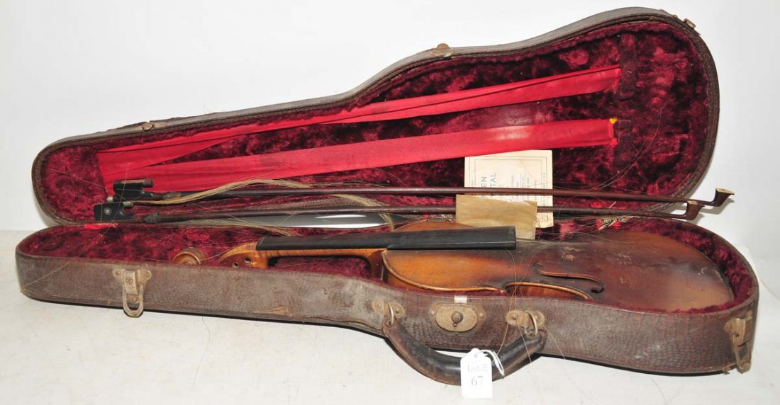 Violin as found: made in Germany, label inside with two bows and case.